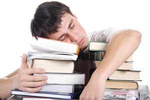 student-sleeping-on-books-300x2001